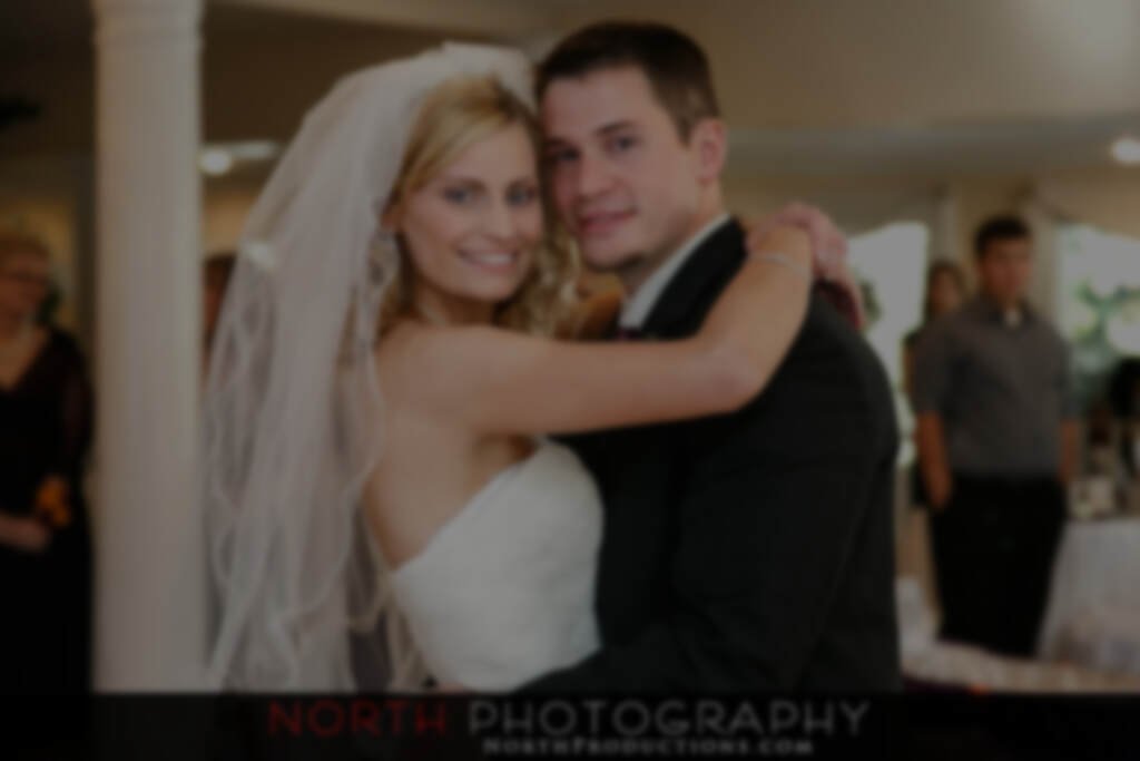 brie and groom hugging