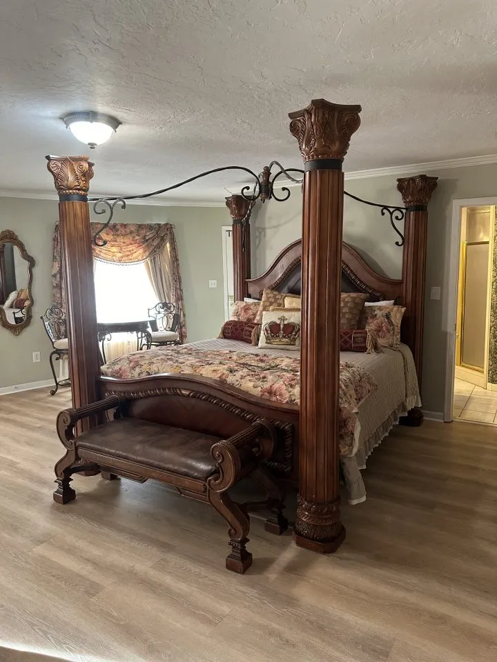 bedroom with poster bed