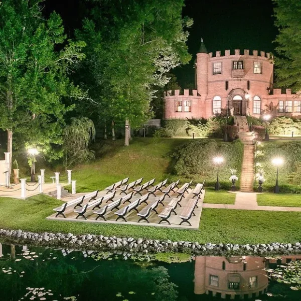 beautiful nighttime picture of a castle with lighting